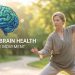 Woman practicing Tai Chi outdoors in nature, demonstrating mindful movement for brain health and cognitive wellness in midlife